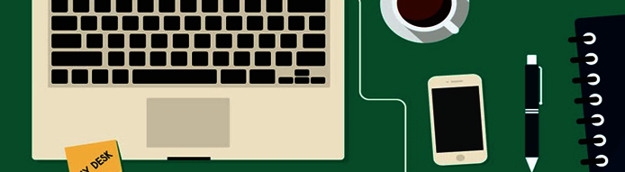 Ein Büroarbeitsplatz mit Notebook und Kaffeetasse